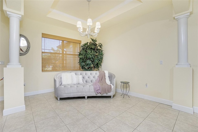 living area with a raised ceiling, a notable chandelier, and light tile patterned flooring