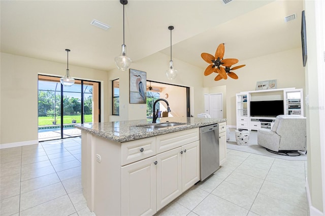 kitchen with ceiling fan, dishwasher, sink, light stone counters, and white cabinets