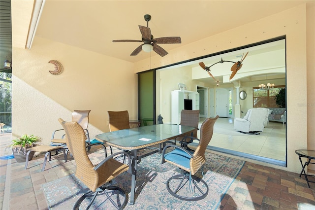 view of patio with ceiling fan