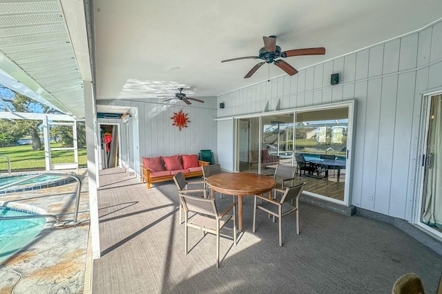 view of patio with an outdoor hangout area and ceiling fan