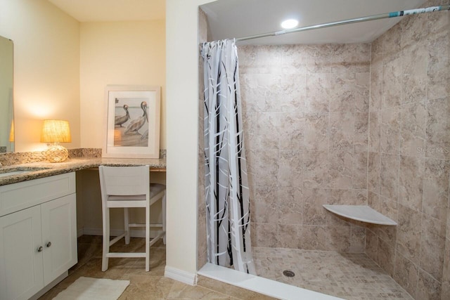 bathroom with vanity and curtained shower