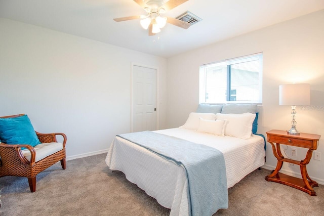 carpeted bedroom with ceiling fan