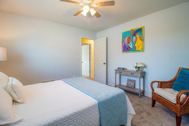 bedroom with ceiling fan and carpet floors