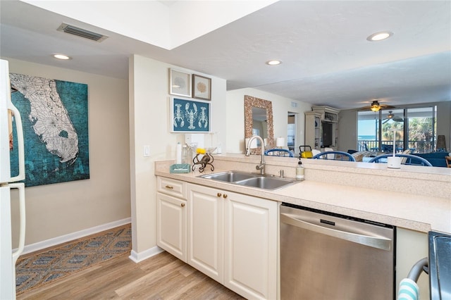 kitchen with ceiling fan, sink, stainless steel dishwasher, white fridge, and light wood-type flooring