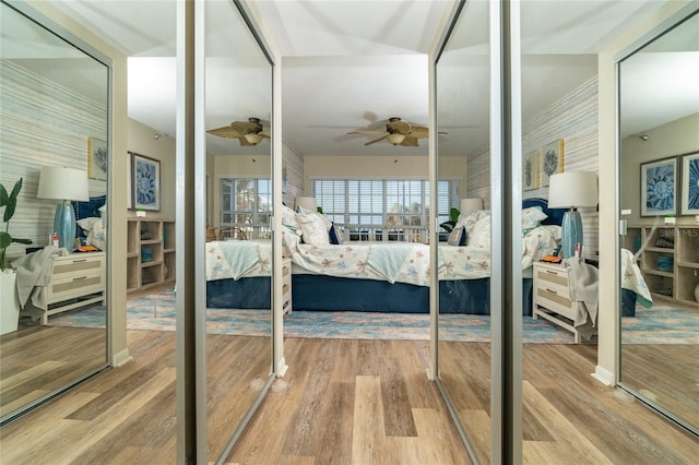 bedroom featuring hardwood / wood-style floors and ceiling fan