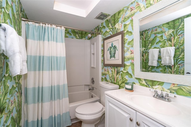 full bathroom featuring vanity, toilet, and shower / bathtub combination with curtain