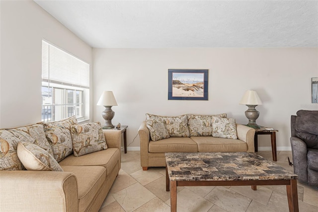 living room with a textured ceiling