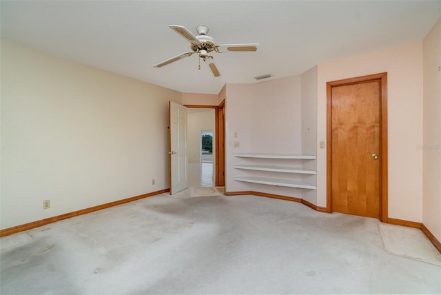 unfurnished bedroom featuring ceiling fan