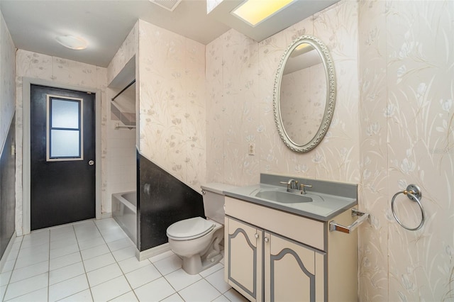 full bathroom featuring vanity, tile patterned flooring, shower / tub combination, and toilet