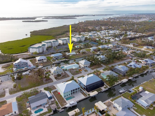 drone / aerial view with a water view