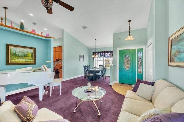 living room featuring carpet floors, high vaulted ceiling, and ceiling fan with notable chandelier