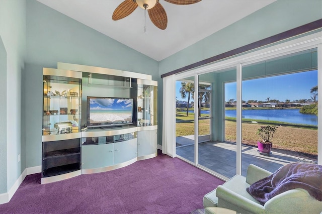 interior space featuring ceiling fan and vaulted ceiling