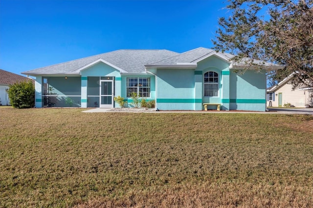 ranch-style house with a front yard