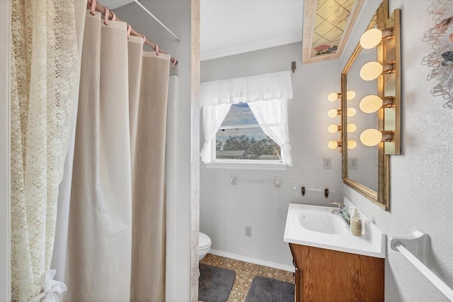 bathroom with a shower with curtain, vanity, toilet, and a textured ceiling