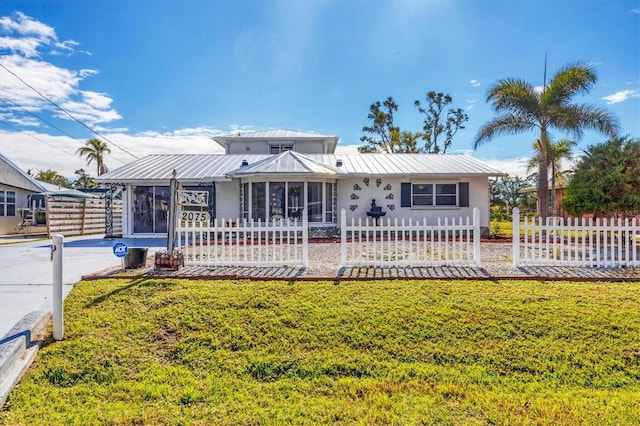 view of front of home with a front lawn