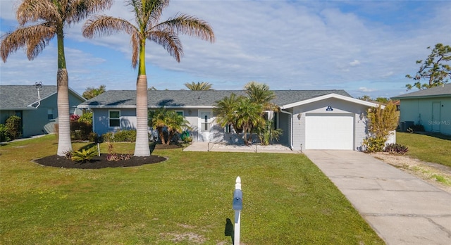 single story home featuring a front yard and a garage