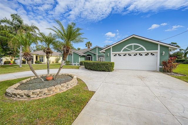 single story home with a front lawn and a garage