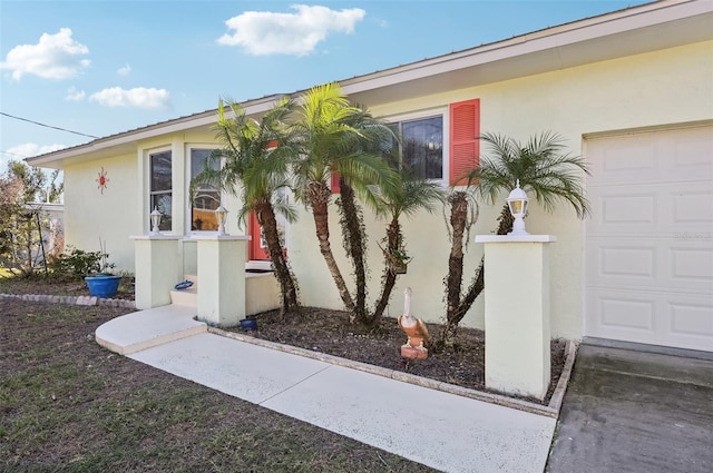 view of property exterior with a garage