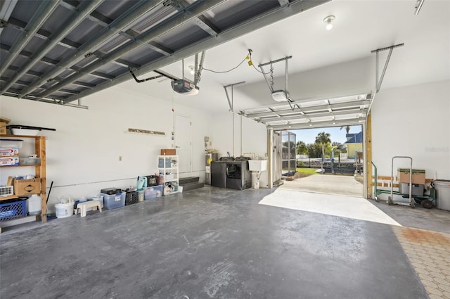 garage featuring a garage door opener