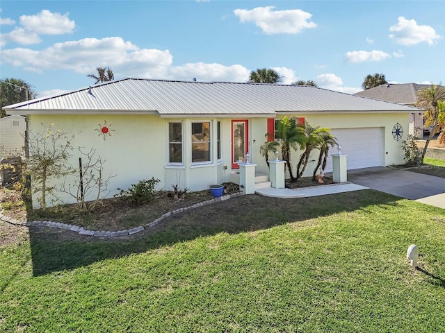 ranch-style house featuring a garage and a front lawn