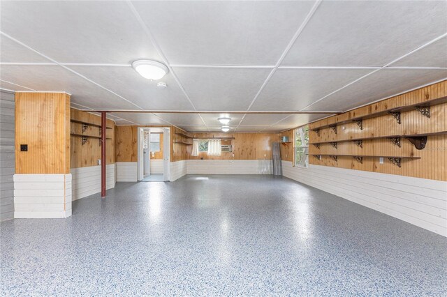 garage with wood walls