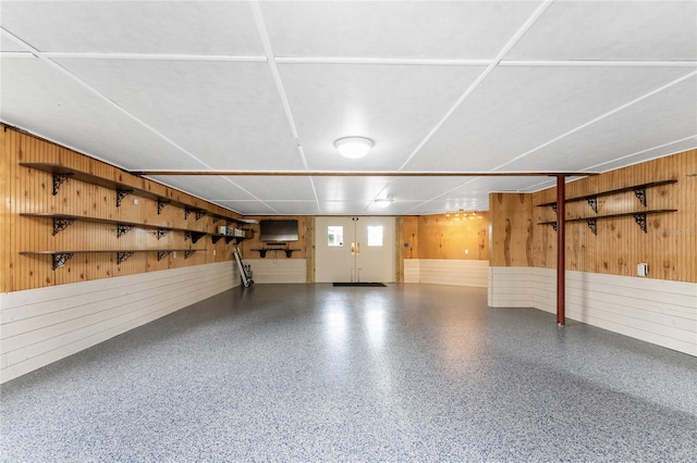 garage with wood walls