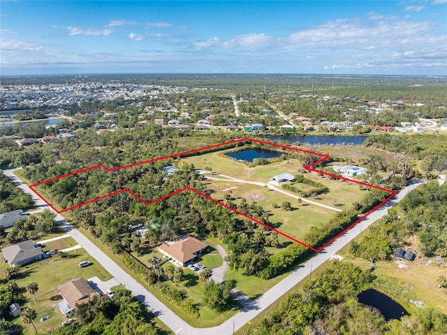 6341 Biggs St, Englewood, FL 34224 - aerial view of property and surrounding area with property boundaries highlighted and a large body of water