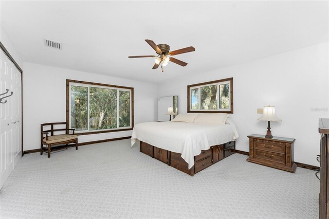 6341 Biggs St, Englewood, FL 34224 - carpeted bedroom with a closet and ceiling fan