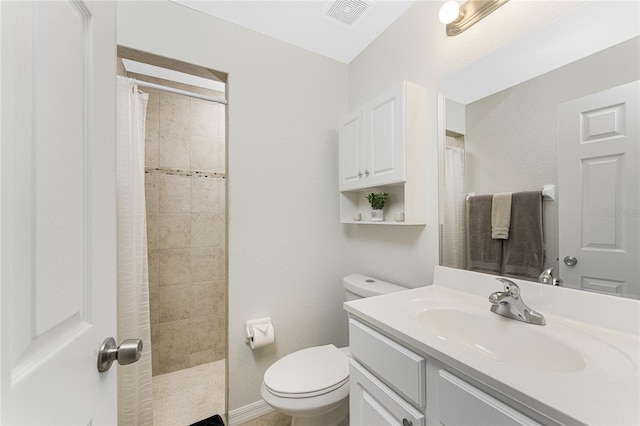 bathroom featuring a shower with curtain, toilet, and vanity