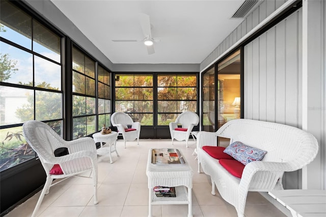 sunroom / solarium with ceiling fan