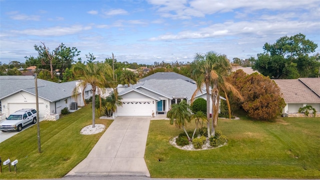 view of front facade featuring a front yard and a garage