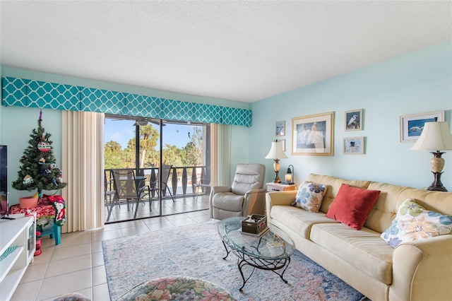 living room with light tile patterned floors and a textured ceiling