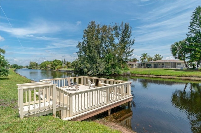 dock area with a deck with water view