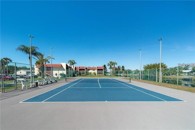 view of tennis court with basketball court