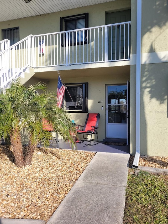 doorway to property with a balcony