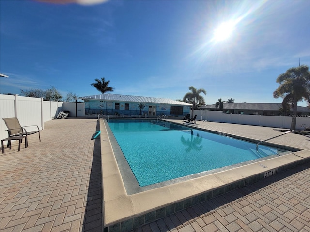 view of pool with a patio area