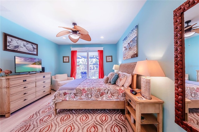 bedroom featuring light wood-type flooring and ceiling fan