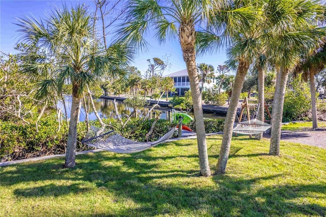 13104 Via Cassia, Placida, FL 33946 - view of green lawn with a water view