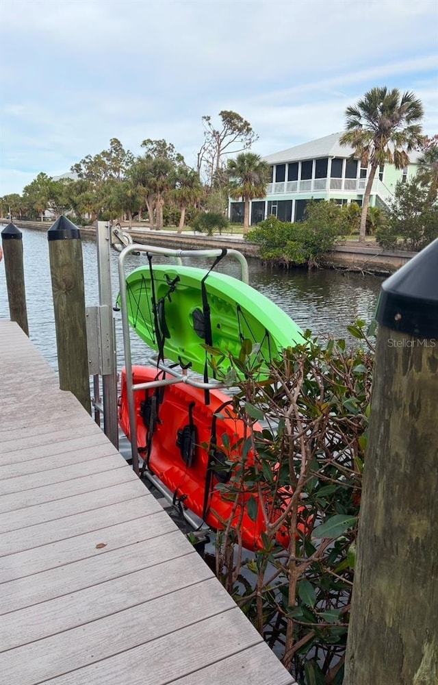 dock area featuring a water view