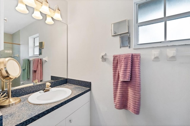 bathroom featuring vanity and a wealth of natural light