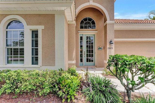 entrance to property with a garage