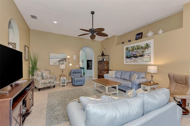 living room with ceiling fan and light tile patterned flooring