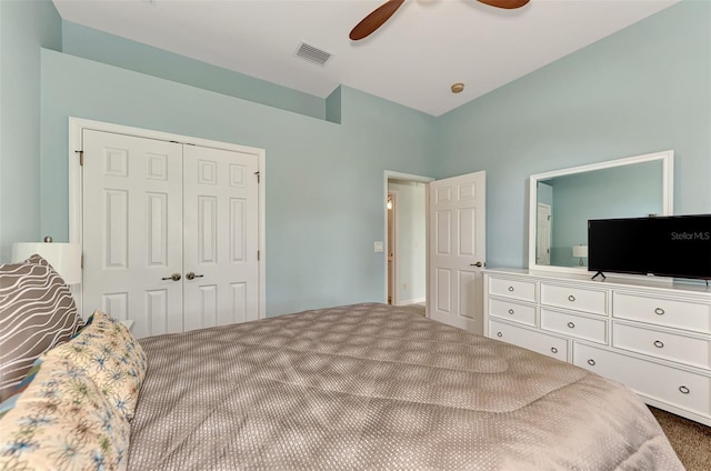 bedroom featuring carpet floors, a closet, and ceiling fan