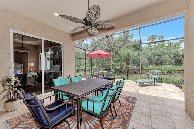 sunroom / solarium with ceiling fan