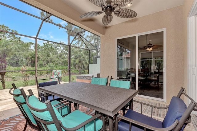 sunroom / solarium with ceiling fan