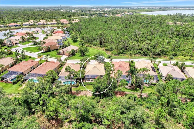 drone / aerial view with a water view