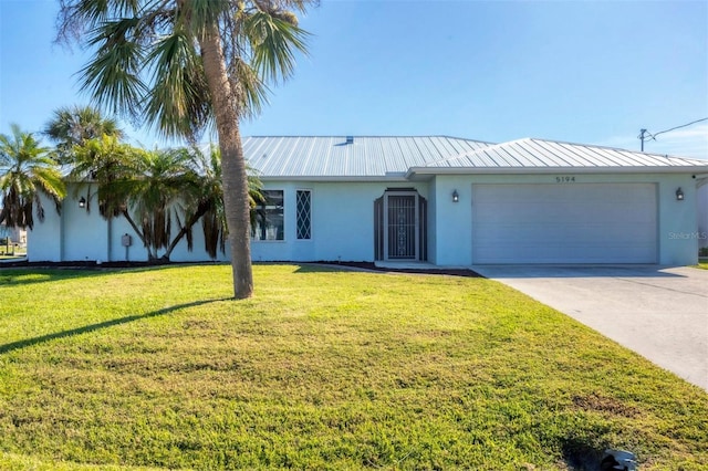 ranch-style house with a front yard and a garage