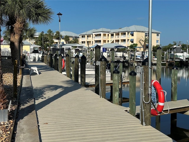 dock area featuring a water view