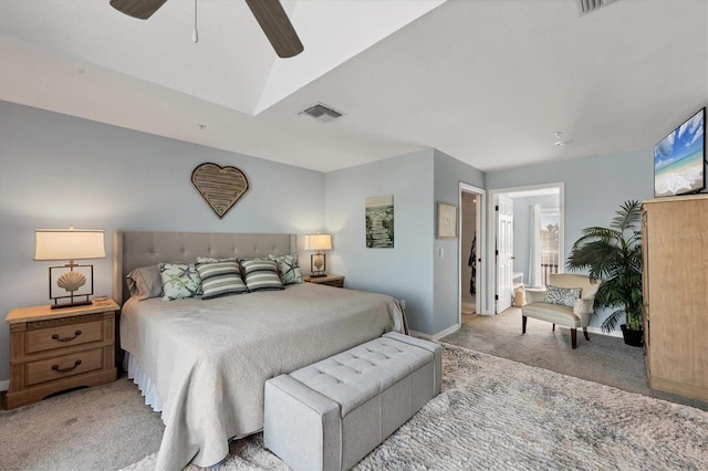 bedroom featuring visible vents, a ceiling fan, baseboards, and light carpet