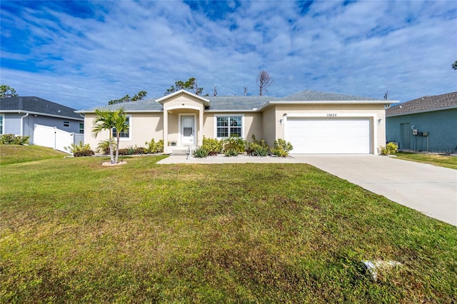 ranch-style house with a garage and a front yard